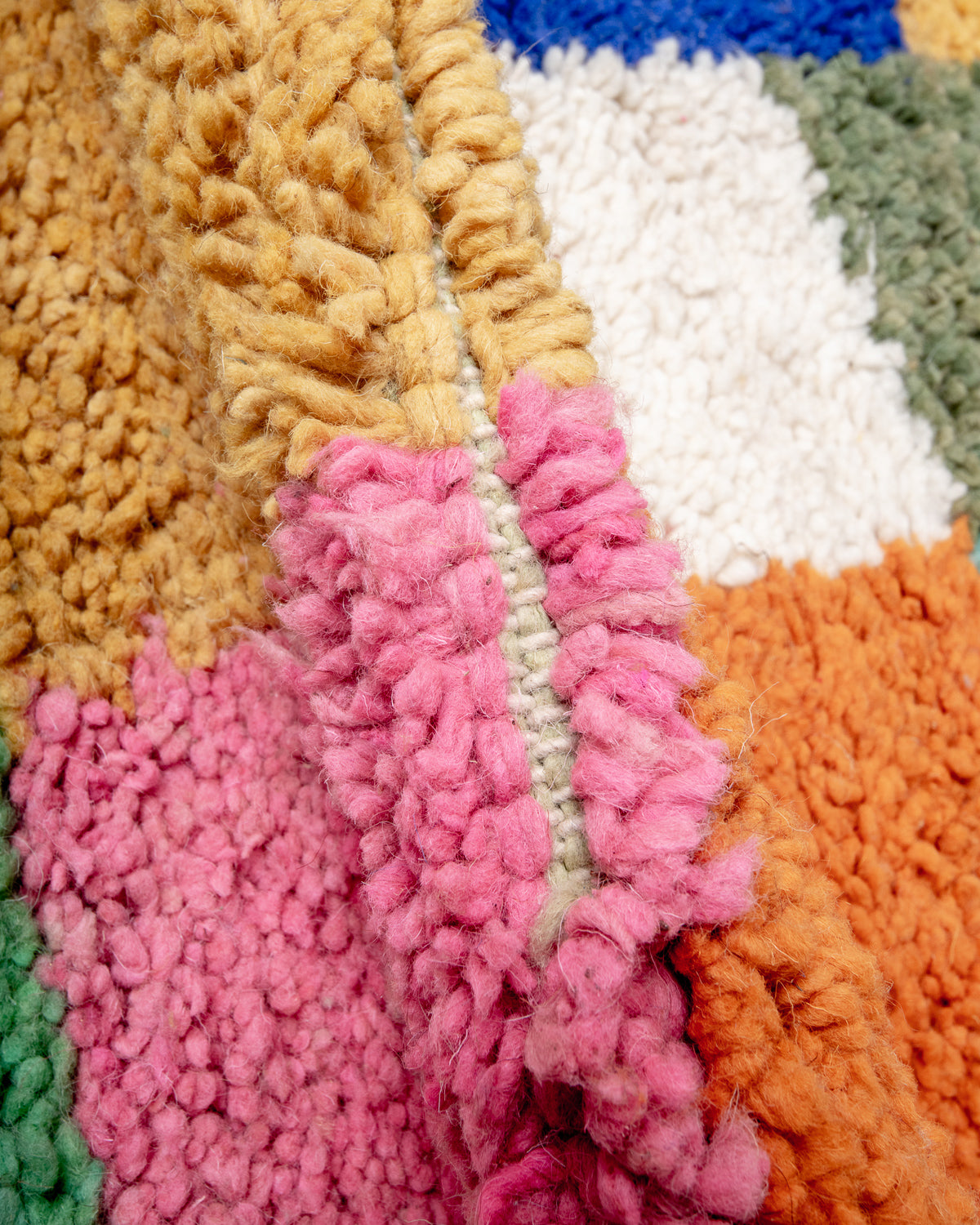 Modern, designer, handcrafted Berber runner rug from Morocco. Beniourain carpet with beautiful colours and patterns and fluffy wool texture.